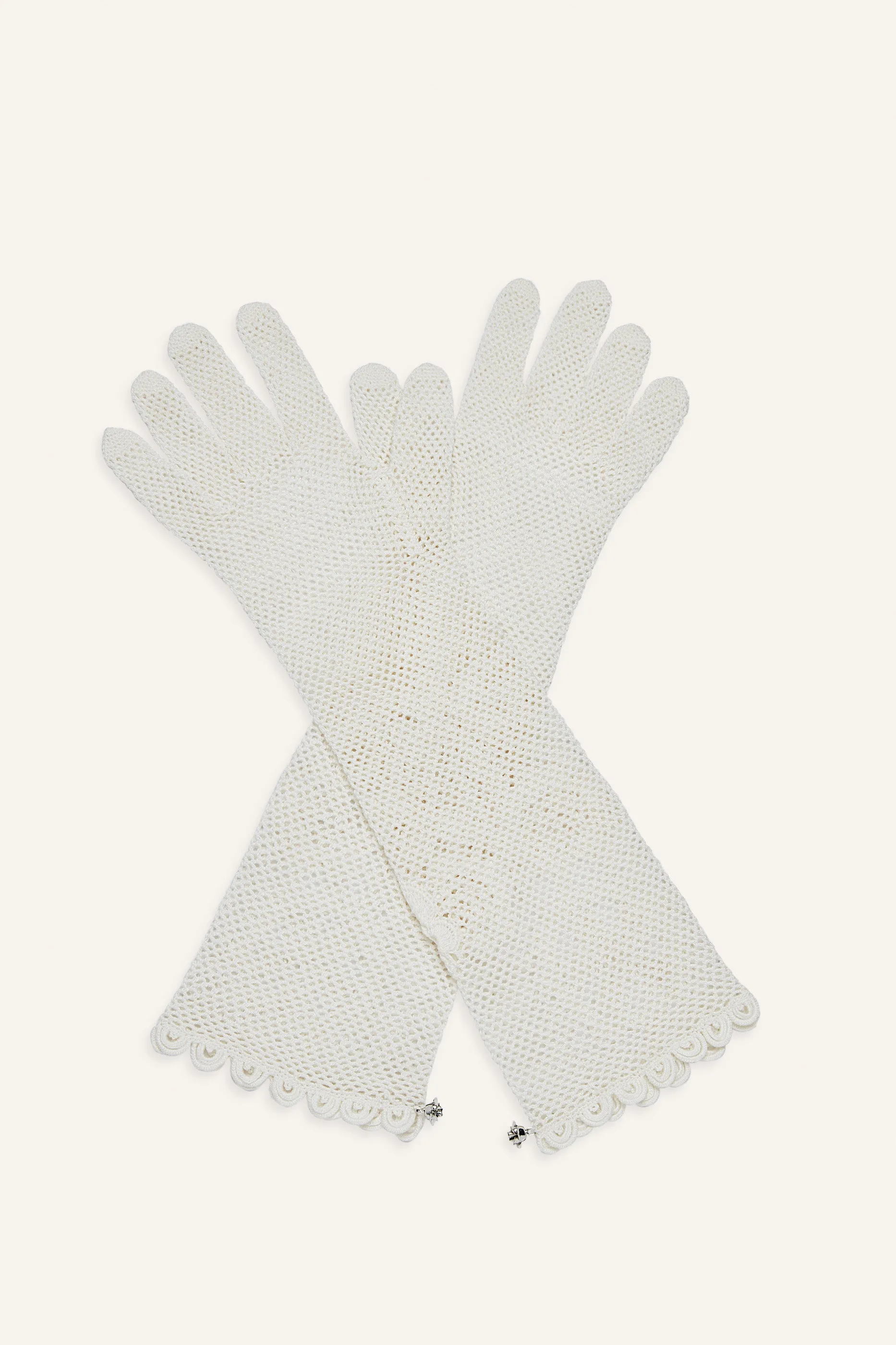 Crochet gloves in cream